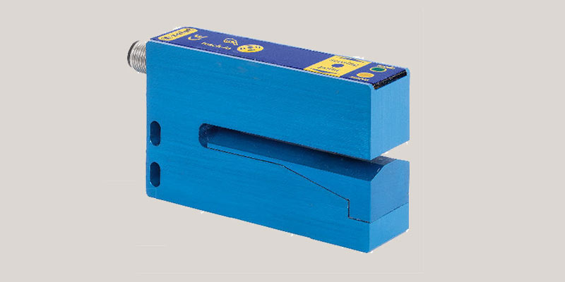 Sensori ad ultrasuoni a forcella per rilevamento etichette